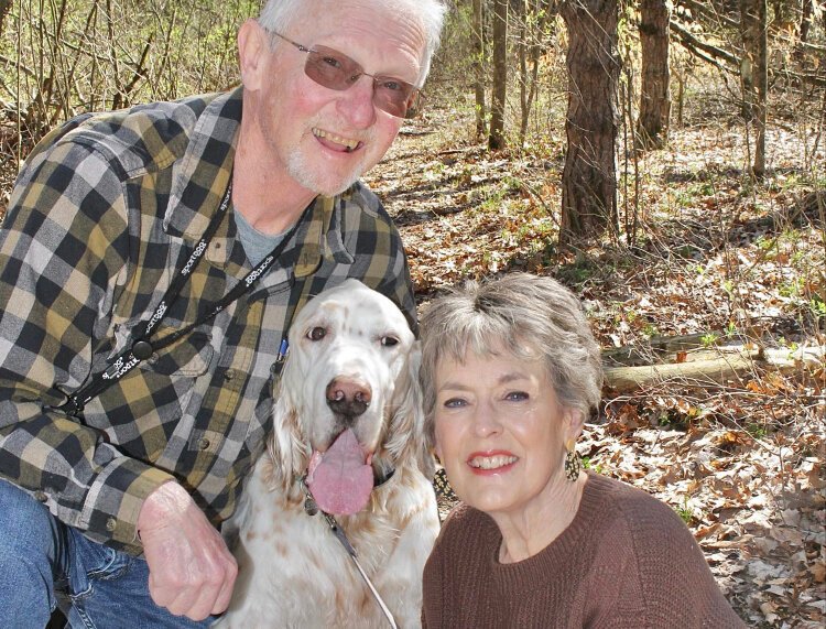 Bill and Carol Ashcroft pose with their dog, Delmon, who died in June.