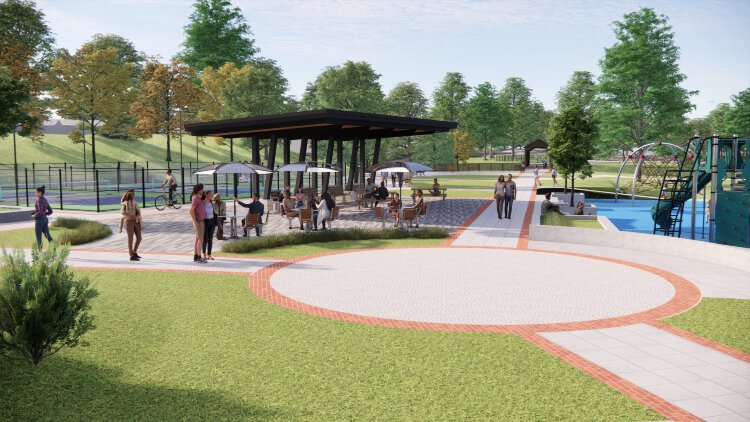 The envisioned park will feature a broad  range of amenities, including a splash pad, pickleball courts, a dog park, river overlooks, picnic spaces,  and more. 