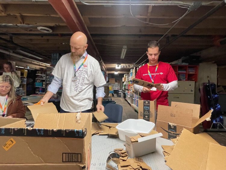 More than 100 Bank of America employees volunteering at six local nonprofits, from Kids Food Basket to the Grand Rapids Children’s Museum. 