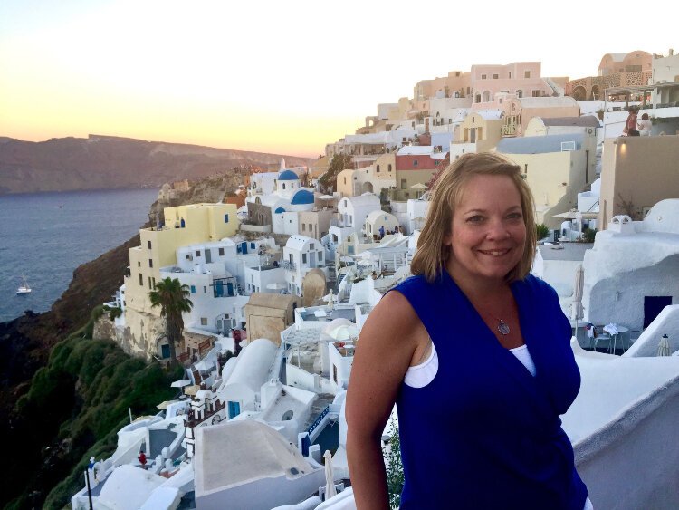 Dawn Pick Benson in Santorini, Greece, famous for its beautiful sunsets.