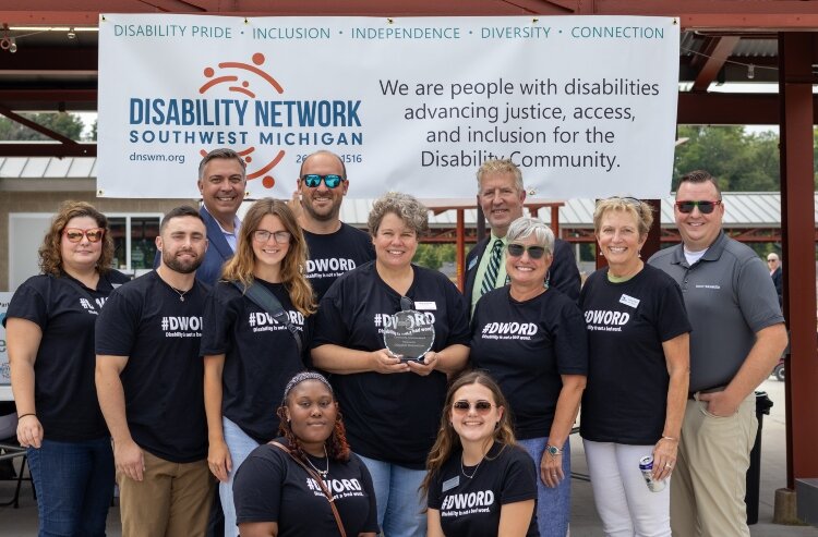 Discover Kalamazoo President and CEO Jane Ghosh with her board members and Kalamazoo Vice Mayor Jeanne Hess.