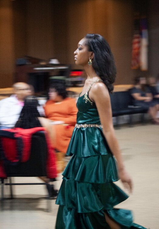 Up-and-coming designer and KCAD alum Demi McNeal debuts her custom evening wear brand, Dominique Alyse, with a successful fashion show in Michigan.