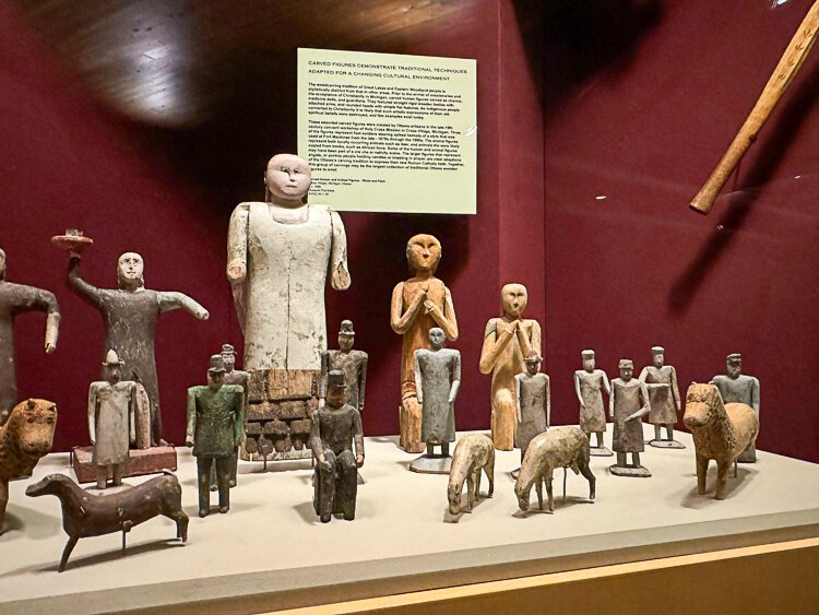 Anishinabek-carved figures from Grand Rapids Public Museum's current display Anishinabek: The People of This Place that closes in January. 