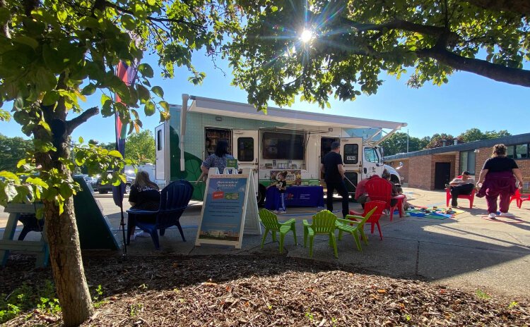 A custom-built KDL bookmobile rolls to parks and schools, bringing literacy and reading fun with it.