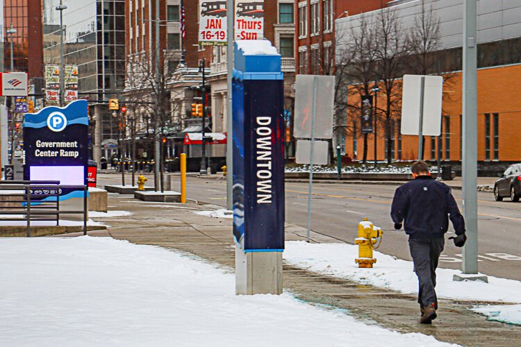 During a recent photo shoot, new Grand Rapids Mayor David LaGrand decided to ditch his car and walk to his next appointment.