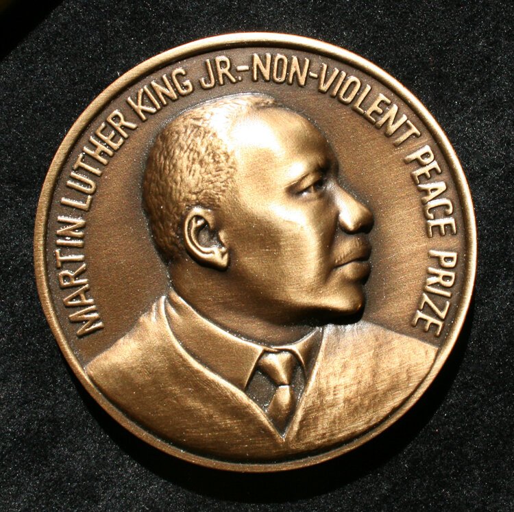 The Martin Luther King Jr. Non-Violent Peace Prize medal designed by Paul Collins.