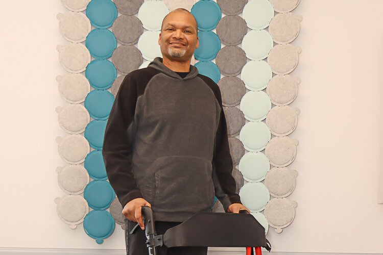 Ronny Richardson poses with his new walker.