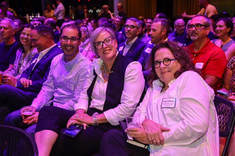  KCAD of Ferris State University's Professor of Product Design Jon Moroney, President Tara McCrackin and Professor of Design Studies Gayle DeBruyn at Tech Week GR.