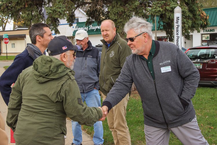 City of Wyoming Mayor Kent Vanderwood (right) welcomes Vets who attended the rededication.