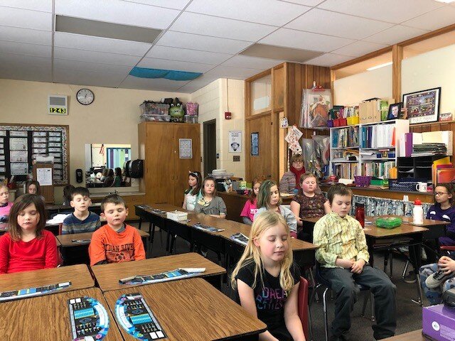 Second graders at Petoskey’s Central Elementary School practice mindfulness in 2019.