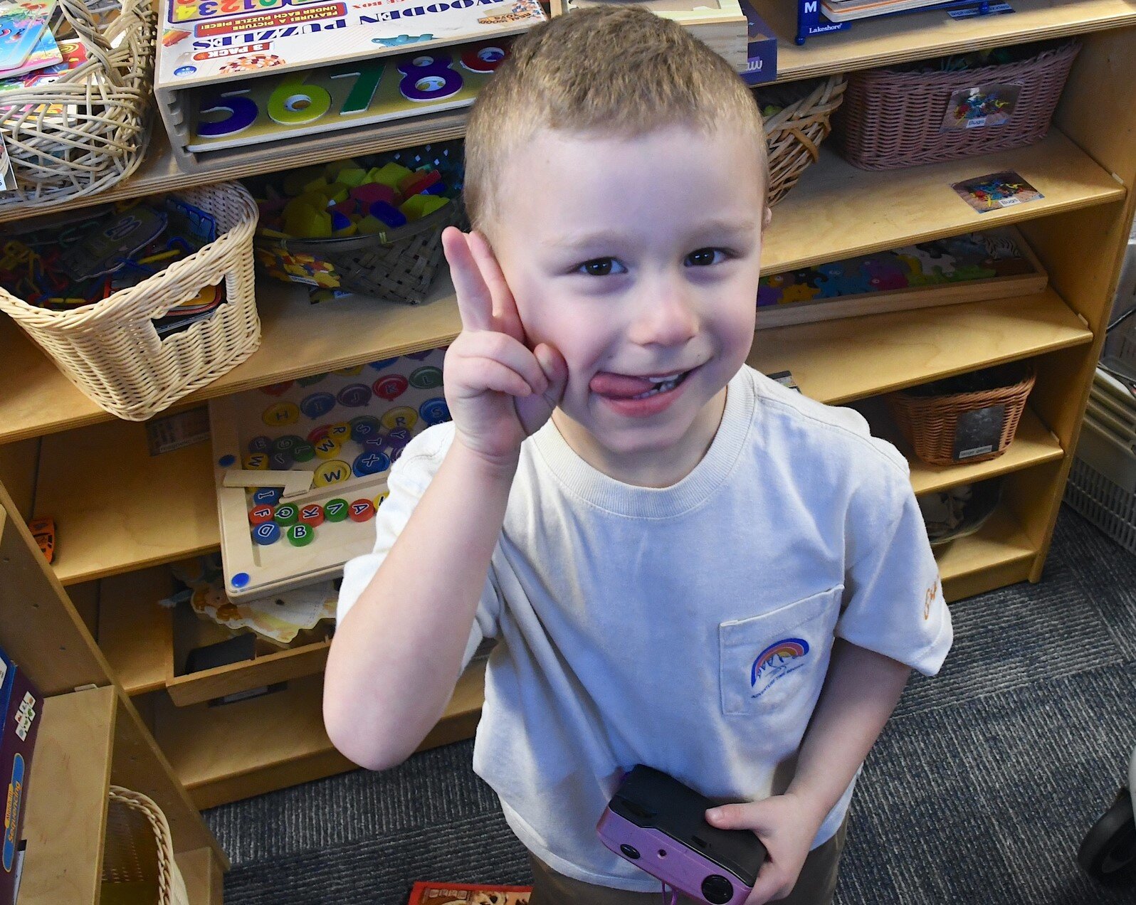 Rogen poses for a picture at Garden of Dreams Preschool in Battle Creek