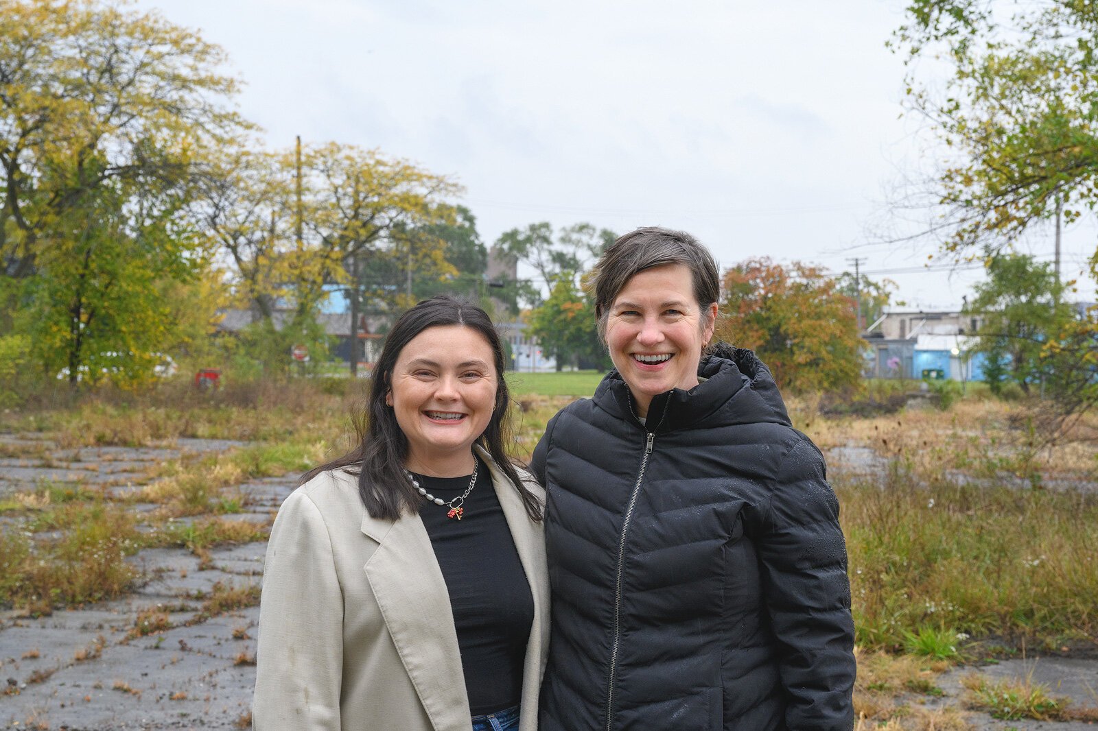 CEDAM’s Emily Reyst with Boot Camp graduate Christine Holmes, Woodbridge Neighborhood Development director of policy and property development.