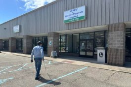 Roel Garcia walks into the Library for the Visually Impaired and Physically Disabled in Muskegon.