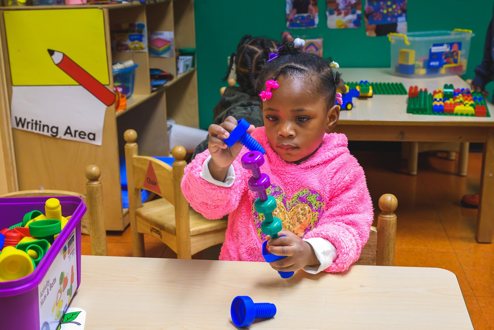 Child at NEST Child Care and Parent Institute in Detroit