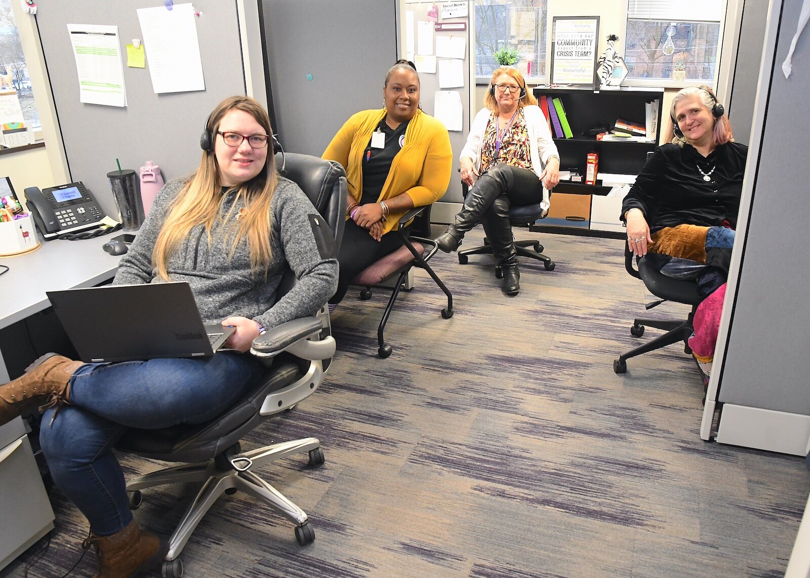 Call line staff working in the team room at Summit Pointe’s First Step Urgent Care.