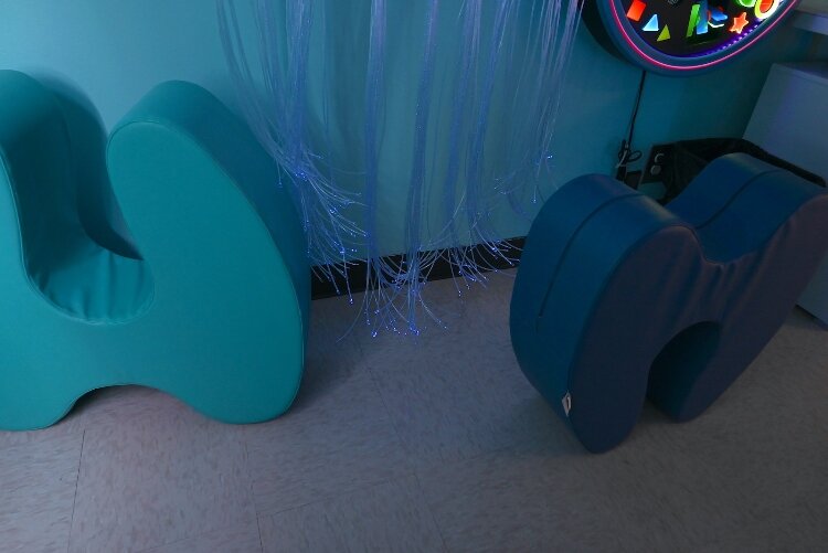The sensory room features a Vibro Acoustic Cloud Chair.